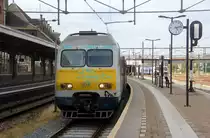Der RE 5387 von Maastricht(NL) nach Lüttich(B) steht in Maastricht(NL) abfahrbreit nach Belgien. 
Aufgenommen vom Bahnsteig 5 in Maastricht(NL).
Bei Sonne und Wolken am Nachmittag vom 11.8.2019.