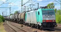 Transchem Sp. z o.o. mit   E 186 243-2  [NVR-Nummer: 91 51 5270 001-8 PL-TM] mit Kesselwagenzug Richtung Polen am 14.08.19 Bahnhof Flughafen Berlin Schönefeld.