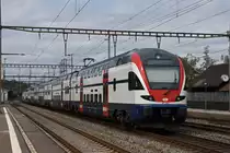 RABe 511 044, auf der S11, durchfährt den Bahnhof Rupperswil. Die Aufnahme stammt vom 31.07.2019.