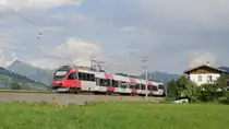Talent 4024 059 als REX 1525 Wörgl Hbf - Schwarzach-ST. Veit zwischen Brixen im Thale und Kirchberg in Tirol, links im Hintergrund das Kitzbüheler Horn (1.996m); 31.08.2019
