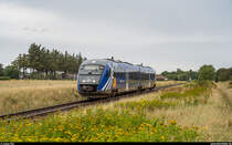 Desiro 504 der Nordjyske Jernbaner am 18. August 2019 auf dem Weg von Hirtshals nach Hjørring kurz nach der Haltestelle Sønderby.