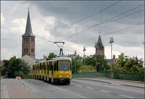 Berlin-Köpenick -

Tatra KT4D auf der Dammbrücke. Im Hintergrund der Turm der Stadtkirche St. Laurentius und der Rathausturm rechts.

18.08.2010 (M)