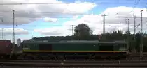 Die Class 66 266 024-9 von Railtraxx fährt mit viel Dieselpower mit einem Güterzug aus Köln-Eifeltor(D) nach Genk-Haven(B) bei der Ausfahrt aus Aachen-West in Richtung Montzen/Belgien. Aufgenommen vom Bahnsteig in Aachen-West. 
Bei Sonne und Wolken am Nachmittag vom 18.9.2019.