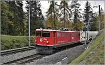 5135 nach Samedan mit Ge 6/6 II 706  Disentis/Mustér  kurz vor Filisur. (06.11.2019)