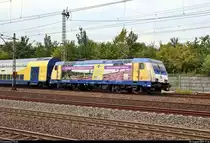 Nachschuss auf 146 541-8, mit Werbung für die Lüneburger Heide GmbH (LHG), der Landesnahverkehrsgesellschaft Niedersachsen mbH (LNVG), vermietet an die metronom Eisenbahngesellschaft mbH, als  Leerfahrt , die den Bahnhof Hamburg-Harburg auf Gleis 9 Richtung Hamburg-Wilhelmsburg durchfährt.
Aufgenommen von Bahnsteig 5/6.
[5.8.2019 | 17:36 Uhr]