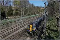 Ein Triebwagenzug der Class 380 zwischen Edinburg Waverley und Haymarket. 

21. April 2018