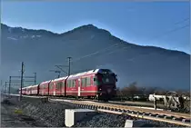 RE1049 mit ABe 8/12 3510 nach Davos zwischen Landquart und Malans. (06.12.2019)