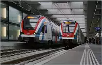 Da Streik bedingt Annemasse pro Stunde nur drei Züge annehmen konnte (oder wollte) fielen die RE Annemasse - Vevey/St-Maurice auf dem Abschnitt Annemasse- Genève ganz aus und einige Léman Express Züge wendeten in Chêne Bourg, wo auch dieses Bild entstand und auf Gleis 2 den nach Genève fahrenden SBB LEX RABe 522 220 als SL 4 sowie auf Gleis 1 den hier wendenden SBB LEX RABe 522 228 zeigt. 

15. Dezember 2019