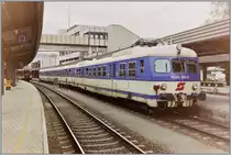 In Kufstein wartet der ÖBB ET 4030 302-6 auf die Abfahrt in Richtung Wörgel.

September 1993