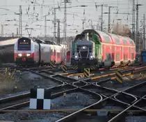 4746 053 als RE 9(76368)von Sassnitz nach Rostock Hbf bei der Einfahrt im Rostocker Hbf neben an kam zum richtigen Moment 650 114-8 raus.30.12.2019