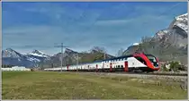 IC569 mit Twindexx RABe502/IR100+RABDe502/IC200 bei Maienfeld mit Gonzen 1829m, Gauschla 2310m und Regitzer Spitz 1135m. (31.12.2019)