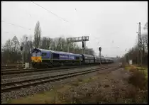 Class 66 29005 von Mma mit dem Namen Ted Gaffney erreicht hier mit ihrem Kohlependel am 8.1.2020 um 11.47 Uhr auf der Rollbahn den Bahnhof Hasbergen.