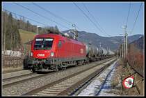 1116 103 mit Güterzug in Hönigsberg am 10.01.2020.