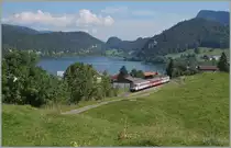 Ein aus ex MThB und RVT Fahrzeugen gebildeter  Schülerzug  ist bei Charbonniers auf dem Weg in Richtung Le Braussus. 

5. Sept. 2014