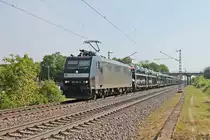 Am Nachmittag des 24.03.2019 fuhr MRCE/CTD 185 556-8 mit dem  Peugeot/Citroen -Autotransportzug (Mulhouse - Trnava) südlich vom Haltepunkt Buggingen über die KBS 703 durchs Markgräflerland in Richtung Freiburg (Breisgau).