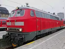 Inzwischen ist alles historisch, was auf diesem Bild zu sehen ist: 218 469 ist nicht mehr in Kempten stationiert, n-Wagen gibt es nicht mehr in München und das Hochhaus im Hintergrund sieht heutzutage auch anders aus. 218 469 hat hier einen RE nach Memmingen am Haken. Aufgenommen am 5.4.2013 in München Hbf  