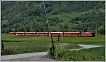 RE1732 nach Landquart mit der betagten Ge 4/4 I 610  Viamala  zwischen Zizers und Igis. (04.05.2020)