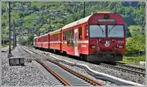 RE1036 nach Disentis/Mustér mit Ge 4/4 II 619  Samedan  und Steuerwagen BDt 1751 auf dem im Bau befindlichen Doppelspurabschnitt zwischen Malans und Landquart. (04.05.2020)