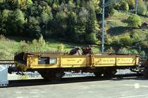 RhB - Xkl 9050 II am 11.10.1996 in M�rel - Baggerwagen - 2-achsig mit 1 offenen Plattform - Baujahr 1906 - Staud - Gewicht 5,33t - Ladegewicht 10,00t - L�P 7,49 m - zul�ssige Geschwindigkeit 55/B km/h - �3=10.02.1984 �2=08.05.1994 - Lebenslauf: ex M 1217 - 1911 M 7087 - 1969 Kkl 7087 - 10.02.1984 Xkl 9050 II - 03/1999 P 10165 M�ller AG
