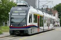 Nachschuss vom ABe 4/8 5014 nach der Abfahrt bei der Haltestelle Dietikon Schöneggstrasse.