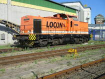 Am Montagabend,den 15.Juni 2020,stand im Stralsunder Nordhafen die LOCON 211.Aufnahme durch den Zaun.