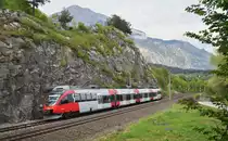 Teil des ausgedünnten Corona-Fahrplanes war am 24.04.2020 auch der Innsbrucker 4024 069-9. Als S 5120 der Linie S1 konnte er am Nachmittag dieses sommerlich warmen Frühlingstages an der markanten Felswand bei Wiesing auf der erneuten Fahrt von Kufstein nach Innsbruck Hbf dokumentiert werden. 