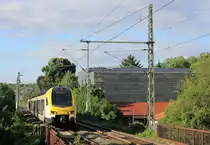 ET 6.03B als RE8 Würzburg-Stuttgart am 30.06.2020 bei der Durchfahrt in Neckarsulm Mitte. 