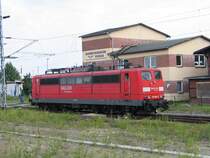 Railion mit 151 088 f�hrt in Wismar am ehemaligen Lokschuppen vorbei. 17.07.2007