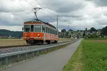 ALTES BIPPERLISI nach wie vor unentbehrlich. Wegen dem verunfallten und sehr stark beschädigten SOBA-STAR Be 4/8 114 musste kurzfristig für den Betrieb auf der kurzen Zweigstrecke Langenthal-St. Urban Ziegelei der Be 4/4 103, ehemals SZB, BTI einspringen. Wegen grossen mehreren Baustellen an der Strecke Solothurn-Niederbipp mit Bahnersatz wurden die Fahrzeuge unüblich stationiert. Das Schwesterfahrzeug, der Be 4/4 104 wurde aus diesem Grund im Depot Wiedlisbach als eiserne Reserve abgestellt. Am 17. Juli 2020 pendelte dadurch der Oldtimer mit Baujahr 1970 als Solotriebwagen zwischen Langenthal und St. Urban hin und her. 
Foto: Walter Ruetsch 