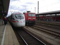 Ein ICE T und eine BR 143 im Hbf N�rnberg. Dise aufname machte ich auf Gleis 9 am 23.06.2007 