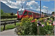 IR1136 aus St.Moritz nach Chur mit Steuerwagen At57802 bei Domat/Ems. (23.07.2020)
