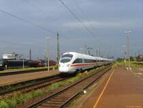 Ein ICE-T (411) bei einer Durchfahrt in Gro�korbetha am 20.07.2007 - im Hintergrund sieht man eine Lok der SBB, eine 155 und die schwarze 185 556 [links] zum eine 233 [rechts - ganz klein]