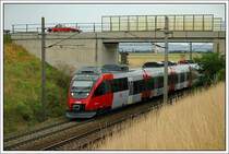 4024 095 als REX 7626  Engerau  von Bratislava-Petrzalka nach Wien S�dbahnhof Ostseite, am 22.7.2007 zwischen Gramatneusiedl und Himberg. 