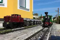 Überholung im Bahnhof Trassdorf am 5.9.2020 der VL21 mit einem Schotterzug von der Stainz 2 mit einem Sonderzug in Richtung Fassl.