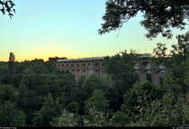 Kurz nach Sonnenuntergang befahren zwei 8442 (Bombardier Talent 2) der Abellio Rail Baden-Württemberg GmbH als RB 19534 (RB17a) von Stuttgart Hbf nach Pforzheim Hbf bzw. RE 19634 (RE17b) nach Heidelberg Hbf das Bietigheimer Eisenbahnviadukt auf der Bahnstrecke Bietigheim-Bissingen–Bruchsal (Westbahn (Württemberg) | KBS 770).
(HDR-Aufnahme)
[30.7.2020 | 21:01 Uhr]