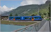 Der ehemalige CEV MVR Be 2/6 7004  Montreux  zeigt sich bei der MIB als Be 2/6 13 und dies in einem sehr gefälligen blauen Farbkleid. Im Bild ist der MIB Be 2/6 13 bei der (hinter dem Zug versteckten) Haltestelle Aareschlucht West zu sehen. 

22. September 2020