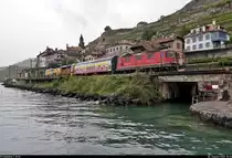 Re 4/4 II 11331 (420 331-1) fährt mit einem Schiebewandwagen und Nivellier-Richt-Stopfmaschine Matisa B 45 UE (BNA 341 | 99 85 91 22 001-2 CH-SCHEU) vorbei am Plage de la Lisette in Saint-Saphorin (CH) Richtung Vevey (CH).

🧰 SBB Cargo AG/Scheuchzer SA
🚩 Bahnstrecke Vallorbe–Domodossola (Simplonstrecke | 100/200)
🕓 4.8.2020 | 10:36 Uhr