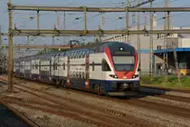 RABe 511 033 durchfährt den Bahnhof Rupperswil. Die Aufnahme stammt vom 14.09.2020.