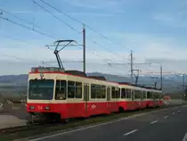 Be 4/4 54 an der Haltestelle Neuhaus (Egg) am 29.03.2010.