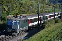 Re 4/4 II 11161 mit dem IR nach Basel SBB, aufgenommen bei Hornussen AG am Abend des 03.10.2020.