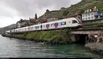 Nachschuss auf RABe 523 021  La Veveyse  und RABe 523 ??? (Stadler FLIRT), die am Plage de la Lisette die Haltestelle Saint-Saphorin (CH) erreichen.

🧰 Réseau Express Régional Vaudois (RER Vaud | SBB)
🚝 S2 Villeneuve (CH)–Vallorbe (CH)
🚩 Bahnstrecke Vallorbe–Domodossola (Simplonstrecke | 100/200)
🕓 4.8.2020 | 10:45 Uhr