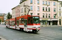 02. August 2003, Cottbus, Straßenbahn Tw 134 fährt auf der Linie 3 in der Bahnhofstrasse/Kreuzung Karl-liebknecht-Straße nach Madlow. In der K-L-Straße gab es, nicht weit von hier, ein Fotogeschäft. Dort habe ich 1967 meinen ersten  richtigen  Fotoapparat gekauft (und leider zu wenig benutzt). Scan vom Color-Negativ