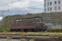 Re 425 178 der BLS wird auf einem Nebengleis beim Bahnhof Pratteln abgestellt. Die Aufnahme stammt vom 28.09.2020.