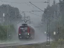 1116 214 kämpft sich Mitte August 2020 bei Fuchsreut durch den Regen.