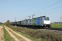 Am Mittag des 10.04.2020 fuhr Rpool/LINEAS 186 295-2  RAILPOOL  zusammen mit Rpool/LINEAS 186 457-8 und dem DGS 40077 (Genk Haven - Novara Boschetto) südlich von Buggingen über die Rheintalbahn in Richtung Schweizer Grenze.