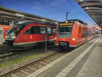 VT 642 507 mit RB 64 nach Pirmasens Hbf steht neben ET 425 761-4 mit S1 nach Mosbach-Neckarelz in Kaiserslautern Hbf, 21.11.2020.