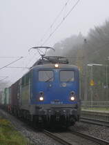 EGP 140 838 mit einem Containerzug in Richtung Hamburg bei Durchfahrt durch Friedrichsruh; 11.12.2020
