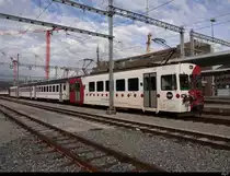 tpf - Reserve Pendelzug an der Spitze der Triebwagen Be 4/4 121 + B 209 + B 207 sowie am Schluss der Steuerwagen ABt 221 abgestellt im Bahnhof Bulle am 19.12.2020
