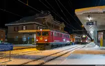 RhB Ge 6/6 II 707 mit Güterzug Pontresina - Landquart am 18. Dezember 2020 in Pontresina.