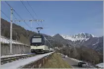 Der Alpina MOB ABe 4/4 9302 und ein weiterer an der Spitze des Zugs sind in Sendy-Sollard auf dem Weg nach Zweisimmen. 

9. Januar 2021